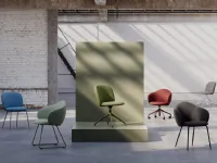 Volta chair in padded fabric by Infiniti