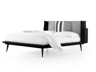 Bed with Birdland headboard by Noctis.