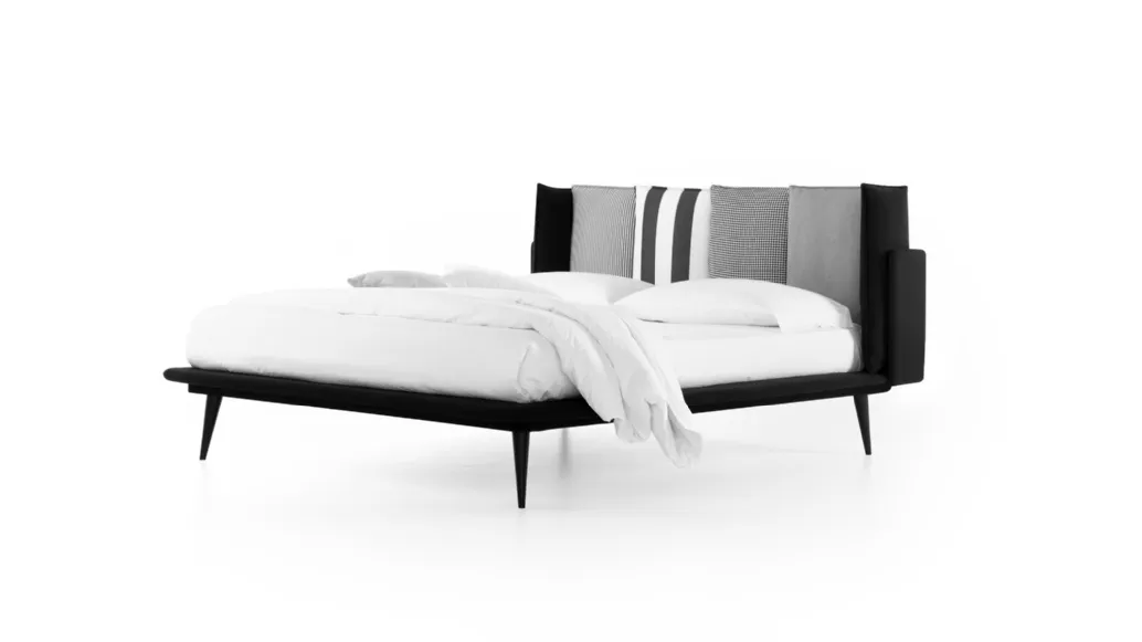 Bed with Birdland headboard by Noctis.