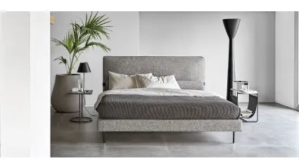 Bed with Mies headboard by Calligaris.