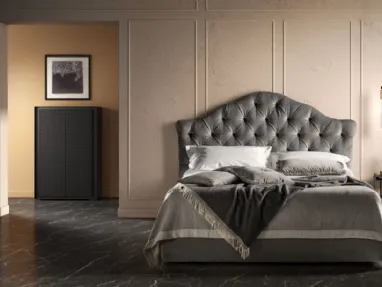 Fabric upholstered bed with a tufted design and a shaped Queen headboard by Bside.