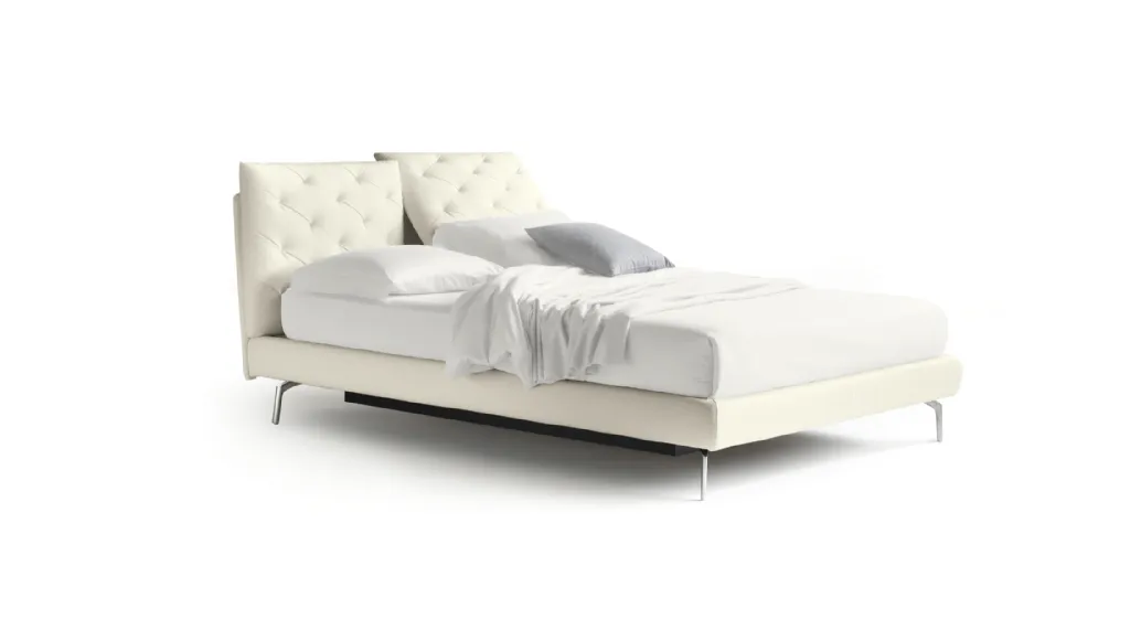 Double bed with capitonné work applied to the two adjustable pillows of the headboard So Ever by Noctis.