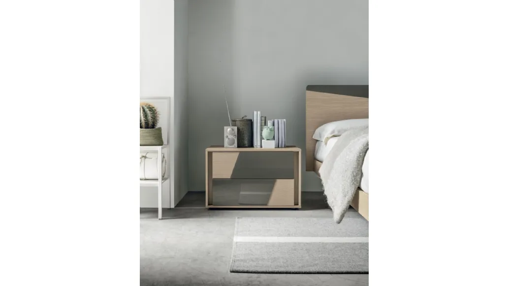 Kross bedside table in textured material with glass inserts by Tomasella