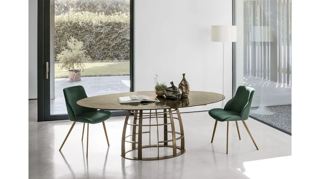 Oval table with Cosmos glass top by Target Point.